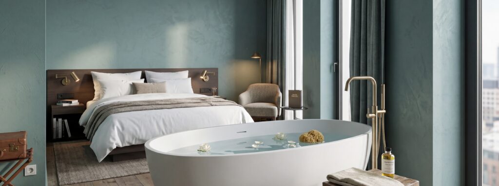 Kalkputz im Badezimmer mit freistehender Badewanne und Bett